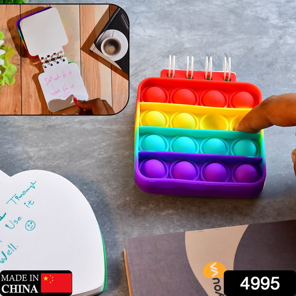 Spiral notebook with  It fidget toy